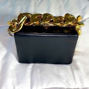 Gold and black mini bag